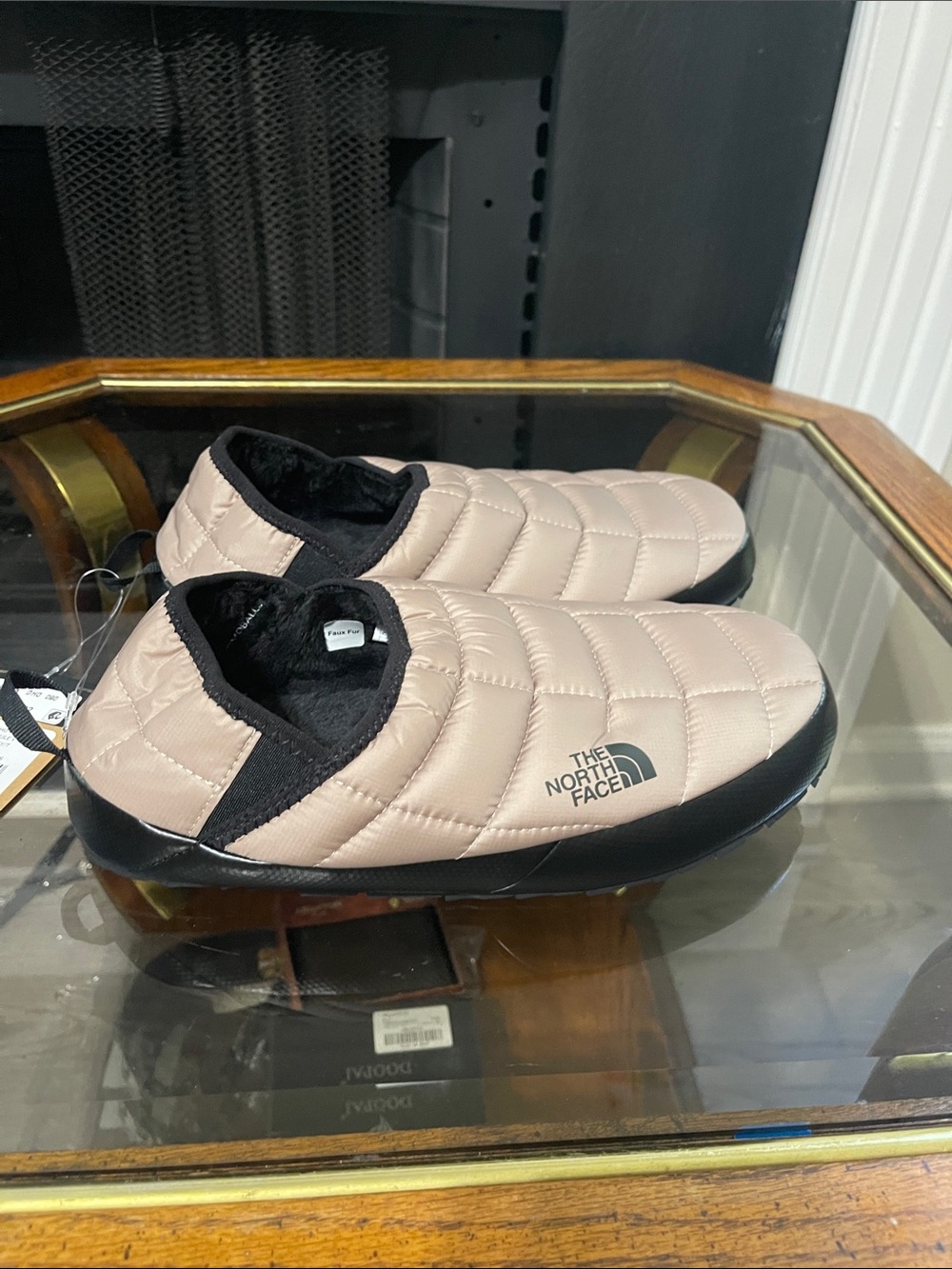 The North Face Quilted Slip-On Mules in Blush Pink with Black Trim